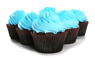 Delicious cupcakes isolated on white background