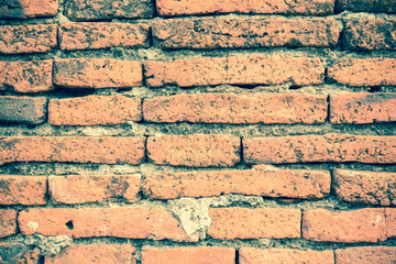 Old broken brick wall