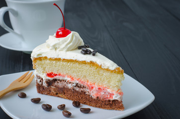 chocolate cake in dish on wooden