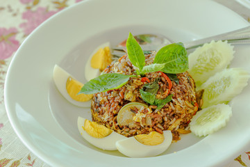 Fried Rice berries and fish with boiled egg