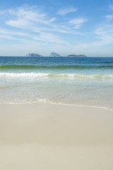 Ipanema Beach Rio de Janeiro Brazil empty morning view with Ilhas Cagarras islands on the horizon