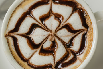 Latte art in white cup