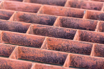 Close up Rust steel grating of drain cover