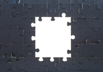 Grey puzzle background with empty space