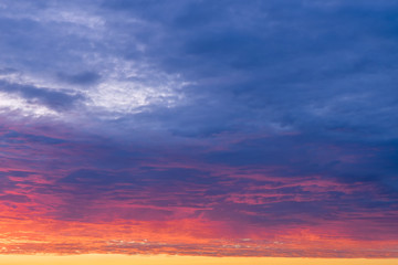 Fototapeta na wymiar Bright sunset with dramatic cloudscape 