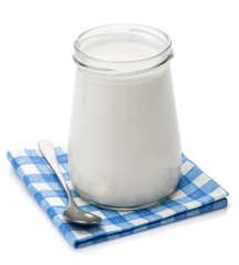 Yoghurt, cream, sour cream in a glass jar and spoon