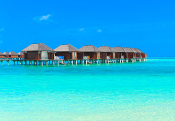  beach with water bungalows Maldives