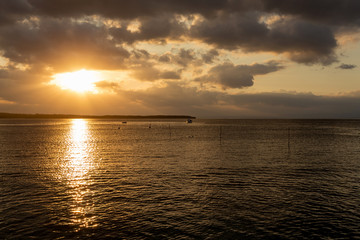 Nusa penida, Bali beach with dramatic sky and sunset