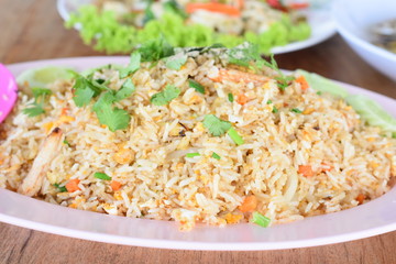 Crab Fried Rice/Fried Rice in pink dish on wood table