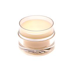 glass jar of face cream isolated on white