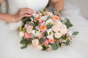 bridal bouquet in the hands of