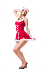 Beautiful happy woman in Santa Claus clothes