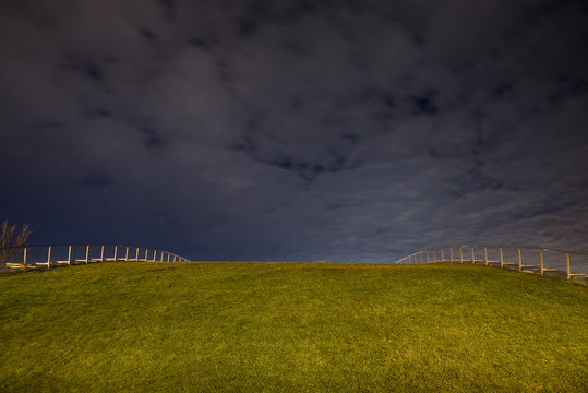 grass covered roof at night