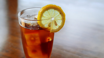 A Glass of Ice Lemon Tea on a Table
