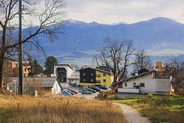 Obraz premium Beautiful super wide-angle aerial view of Innsbruck, Austria with skyline, Alps mountains and scenery beyond the city, and Inn river 