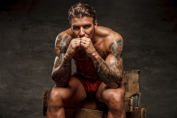 Tattooed muscular guy.