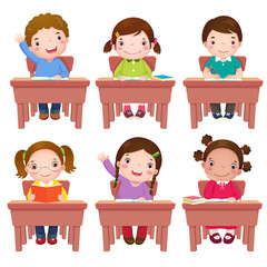 School kids sitting on table