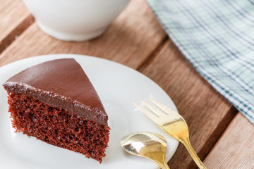 cup of coffee and chocolate cake