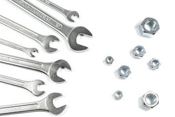 Wrenches Of Different Sizes Against Nuts Of Different Sizes