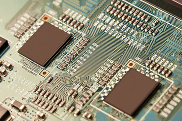 Electronic circuit board close up.