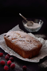 muffins with cranberries in powdered sugar