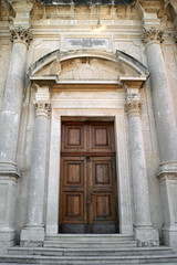 Fototapeta na wymiar Entrance to the Church of the Nativity of the Virgin (Prcanj)