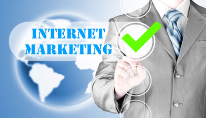 business man pressing checkbox  internet marketing