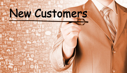 businessman writing new customers