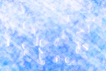 Solf blue lights festive blurry and star on white bokeh abstract