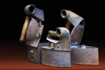 Three vintage rusty irons