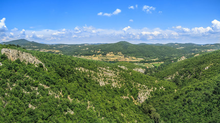 Fototapeta na wymiar Panorama of green rocky canyon 