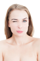 Obraz na płótnie Canvas Female model with natural makeup winking
