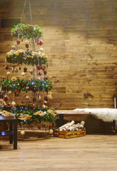 Christmas tree decoration with wooden wall background