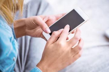 Close up of nice girl with smartphone