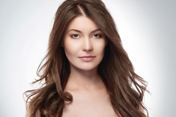 Naklejka premium Attractive woman with long brown hair.