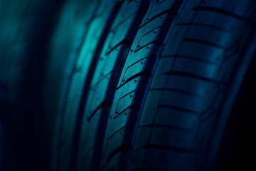 close up car tyres on dark background