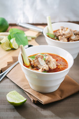 Hot and spicy soup with pork ribs,shallow Depth of Field,Focus on  pork ribs.