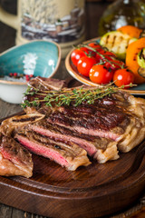 Beef steaks with grilled vegetables and seasoning