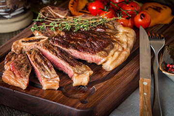 Beef steaks with grilled vegetables and seasoning