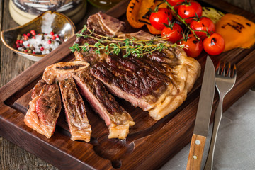 Beef steaks with grilled vegetables and seasoning