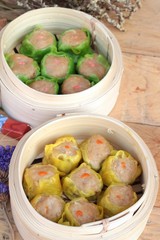 Chinese steamed dumpling and hot tea delicious.