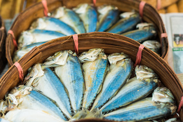 Mackerel fish in basket at market