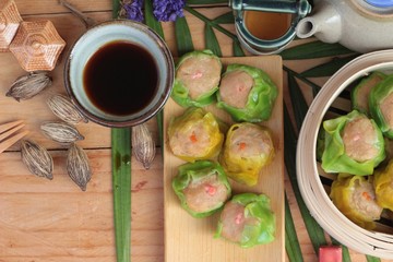Chinese steamed dumpling and hot tea delicious.