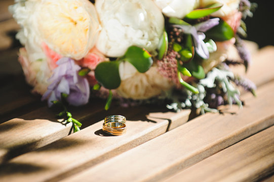 Rings and Bouquet on Table