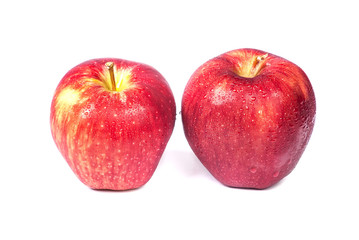Fresh red apples with water drop isolated on white background