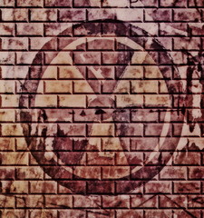 grunge radiation symbol on old red brick wall background