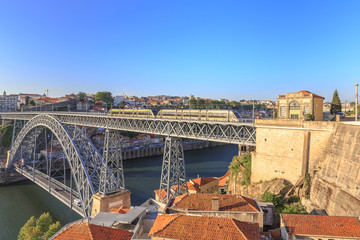 The Dom Luiz bridge. A metro train can be seen on the bridge of
