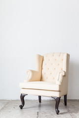 vintage sofa on white wall.