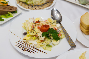 Salad with caviar and eggs