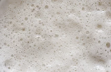 Foto auf Leinwand close up of Beer foam © PixieMe